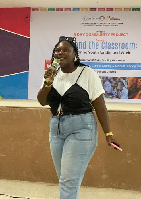 A Sussflow speaker addressing young people at a community project