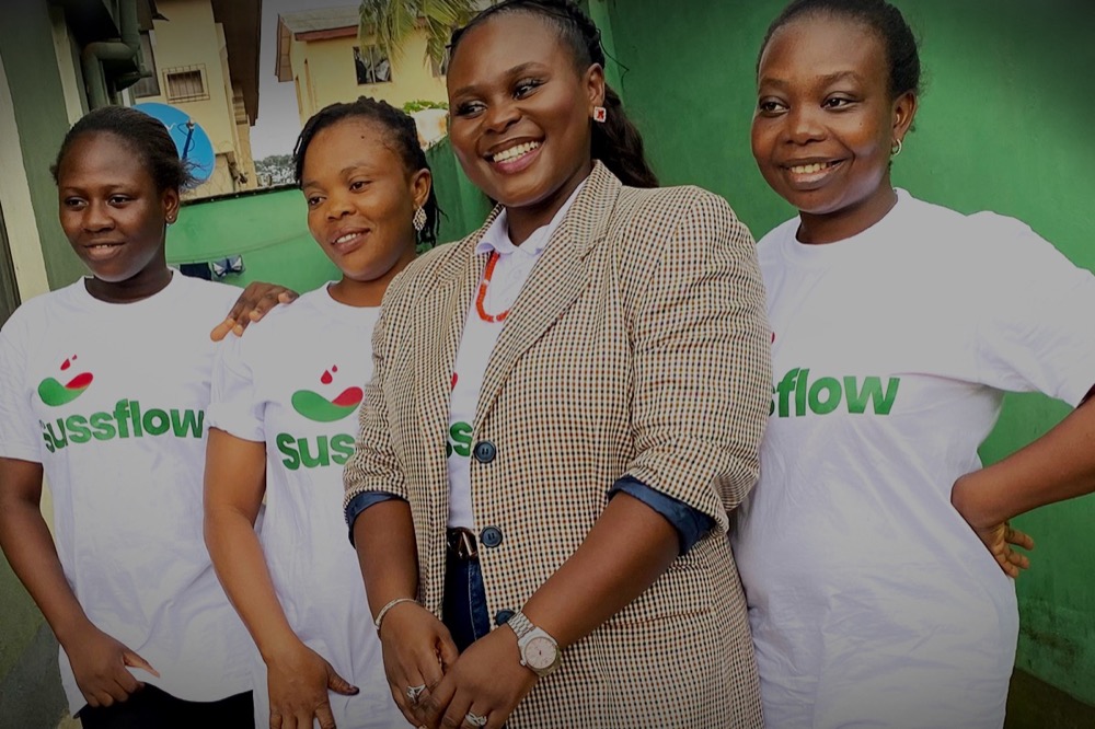 Four women from the Sussflow team in branded T-shirts